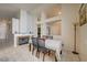 Bright dining area featuring modern decor and a charming fireplace at 2308 Avery Dr, Las Vegas, NV 89108