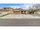 Attractive one-story home with two-car garage, a well-maintained front yard, and a covered porch at 2308 Avery Dr, Las Vegas, NV 89108
