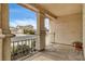 Covered front porch highlighting the support columns and view of the street at 2308 Avery Dr, Las Vegas, NV 89108