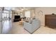 Cozy living room with tile flooring, neutral walls, and comfortable furnishings at 2308 Avery Dr, Las Vegas, NV 89108