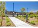 Community pool with lounge chairs and manicured landscaping at 2685 Conifer Canyon St, Henderson, NV 89044