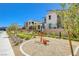 Modern homes line the street with well-maintained landscaping and outdoor fitness equipment at 2685 Conifer Canyon St, Henderson, NV 89044