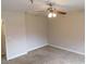 Bedroom featuring a ceiling fan, neutral paint, and carpeted floors, offering a cozy atmosphere at 2750 S Durango Dr # 2072, Las Vegas, NV 89117