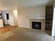 Inviting living room with a fireplace and a mix of carpet and hard surface flooring at 2750 S Durango Dr # 2072, Las Vegas, NV 89117