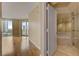 Modern bathroom with walk-in shower and city views from the large windows at 2777 Paradise Rd # 607, Las Vegas, NV 89109