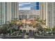 Beautiful Mediterranean-style building between condo towers boasts lush landscaping, entrance and porte cochere at 2777 Paradise Rd # 607, Las Vegas, NV 89109