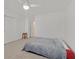 Simple bedroom featuring carpet, ceiling fan, a bed, and a closet, offering a cozy and functional space for relaxation at 2949 White Selzter Ct, Las Vegas, NV 89122