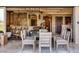 Open-concept dining room with a view of the kitchen and bar area at 30 Meadowhawk Ln, Las Vegas, NV 89135