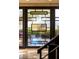 Stunning front door features unique, patterned glass and modern design elements at 30 Meadowhawk Ln, Las Vegas, NV 89135
