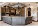 Stylish kitchen with custom cabinetry, pendant lighting, and granite countertops at 30 Meadowhawk Ln, Las Vegas, NV 89135