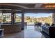 Bright open living area with views, dining, and modern furnishings at 30 Meadowhawk Ln, Las Vegas, NV 89135