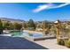 Beautiful pool and spa with mountain views, perfect for relaxation and entertainment at 30 Meadowhawk Ln, Las Vegas, NV 89135