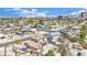 A neighborhood featuring a mix of architectural styles with palm-lined streets set against a clear sky and distant mountains at 3009 Merritt Ave, Las Vegas, NV 89102