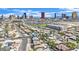 Cityscape view over a residential neighborhood featuring diverse architecture and lush greenery in the foreground at 3009 Merritt Ave, Las Vegas, NV 89102