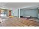 Bedroom featuring hardwood floors, a window, and closet space at 3009 Merritt Ave, Las Vegas, NV 89102