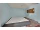 Bedroom featuring hardwood floors, a window, and closet space at 3009 Merritt Ave, Las Vegas, NV 89102