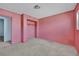 A bright bedroom with a closet and doorway needing renovation at 3009 Merritt Ave, Las Vegas, NV 89102