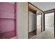 Bedroom closet with pink accents and mirrored doors at 3009 Merritt Ave, Las Vegas, NV 89102