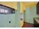 View of the kitchen features a wall oven and linoleum flooring at 3009 Merritt Ave, Las Vegas, NV 89102
