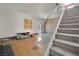 Living room with staircase and lots of natural light at 3009 Merritt Ave, Las Vegas, NV 89102