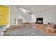 Living room with fireplace, yellow door, and staircase at 3009 Merritt Ave, Las Vegas, NV 89102