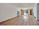 Spacious living room with hardwood floors and sliding glass doors leading to the backyard at 3009 Merritt Ave, Las Vegas, NV 89102