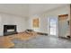 Living room features a fireplace and glass door at 3009 Merritt Ave, Las Vegas, NV 89102