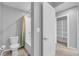Bathroom with a shower-tub combo alongside the toilet at 3192 Timorasso Ave, Henderson, NV 89044