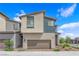 Charming two-story home featuring a modern design and a neatly landscaped front yard at 3192 Timorasso Ave, Henderson, NV 89044