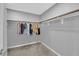 Spacious walk-in closet with ample storage on multiple levels at 3192 Timorasso Ave, Henderson, NV 89044