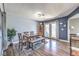 Cozy dining area featuring a wooden table, bench seating, and stylish decor at 361 Tobler Dr, Las Vegas, NV 89145