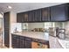 View of countertops with stainless dishwasher and sink and microwave at 361 Tobler Dr, Las Vegas, NV 89145