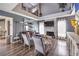 Bright and airy living room with high ceilings, modern furniture, and a cozy fireplace at 361 Tobler Dr, Las Vegas, NV 89145