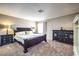 Spacious primary bedroom featuring neutral walls, plush carpeting, and an abundance of natural light at 361 Tobler Dr, Las Vegas, NV 89145