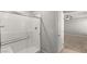 Bright bathroom with modern shower, tile flooring, and access to an ensuite bathroom at 382 Scarlet Pine Ct, Henderson, NV 89044