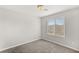 Light and airy bedroom features carpeted floors, window, and neutral walls at 382 Scarlet Pine Ct, Henderson, NV 89044