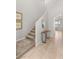 Inviting entryway with staircase, high ceilings, stylish mirror, and a convenient console table at 382 Scarlet Pine Ct, Henderson, NV 89044