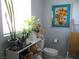 Cozy bathroom with decor, plants, flowers, and art piece for a unique, comforting atmosphere at 432 Sellers Pl, Henderson, NV 89011
