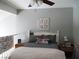 Loft bedroom featuring neutral wall color, a comfortable bed and decoratively adorned nightstands at 432 Sellers Pl, Henderson, NV 89011
