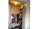 Closet with clothes hanging and folded on shelves at 432 Sellers Pl, Henderson, NV 89011