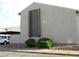 Exterior view of a building with a carport on the side at 432 Sellers Pl, Henderson, NV 89011