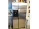 Stainless steel side-by-side refrigerator in the kitchen at 432 Sellers Pl, Henderson, NV 89011
