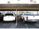 Covered parking spot with two cars parked underneath at 432 Sellers Pl, Henderson, NV 89011