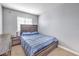 Cozy bedroom with a comfortable bed and simple decor at 4381 Coyote Crest Ct, Las Vegas, NV 89147