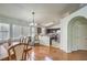 Inviting dining area featuring hardwood floors and natural light at 4381 Coyote Crest Ct, Las Vegas, NV 89147