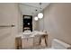 Well-lit bathroom featuring a modern sink, toilet, and contemporary fixtures at 4381 W Flamingo Rd # 9301, Las Vegas, NV 89103