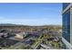 Stunning aerial view of the city and surrounding mountains from a high-rise balcony at 4381 W Flamingo Rd # 9301, Las Vegas, NV 89103