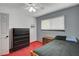 Bedroom with carpet, ceiling fan, window, and furniture at 4678 San Benito St, Las Vegas, NV 89121