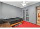 Bedroom with closet, ceiling fan, window, and carpet at 4678 San Benito St, Las Vegas, NV 89121