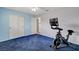 Bedroom with ceiling fan, exercise bike and closet at 4678 San Benito St, Las Vegas, NV 89121
